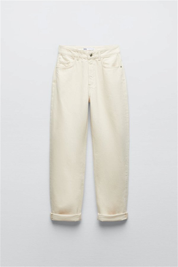 High rise five pocket jeans. Straight leg and turned-up cuffs. Front zip and metal button closure. - Ecru | ZARA United States