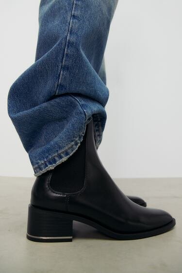FLAT ANKLE BOOTS WITH HEEL DETAIL